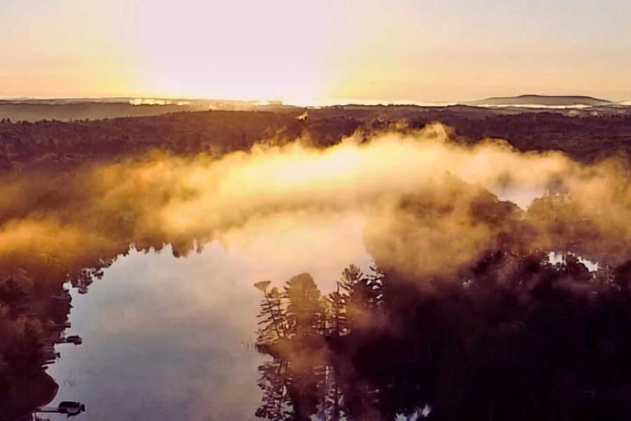Mistical clouds between lake and sky